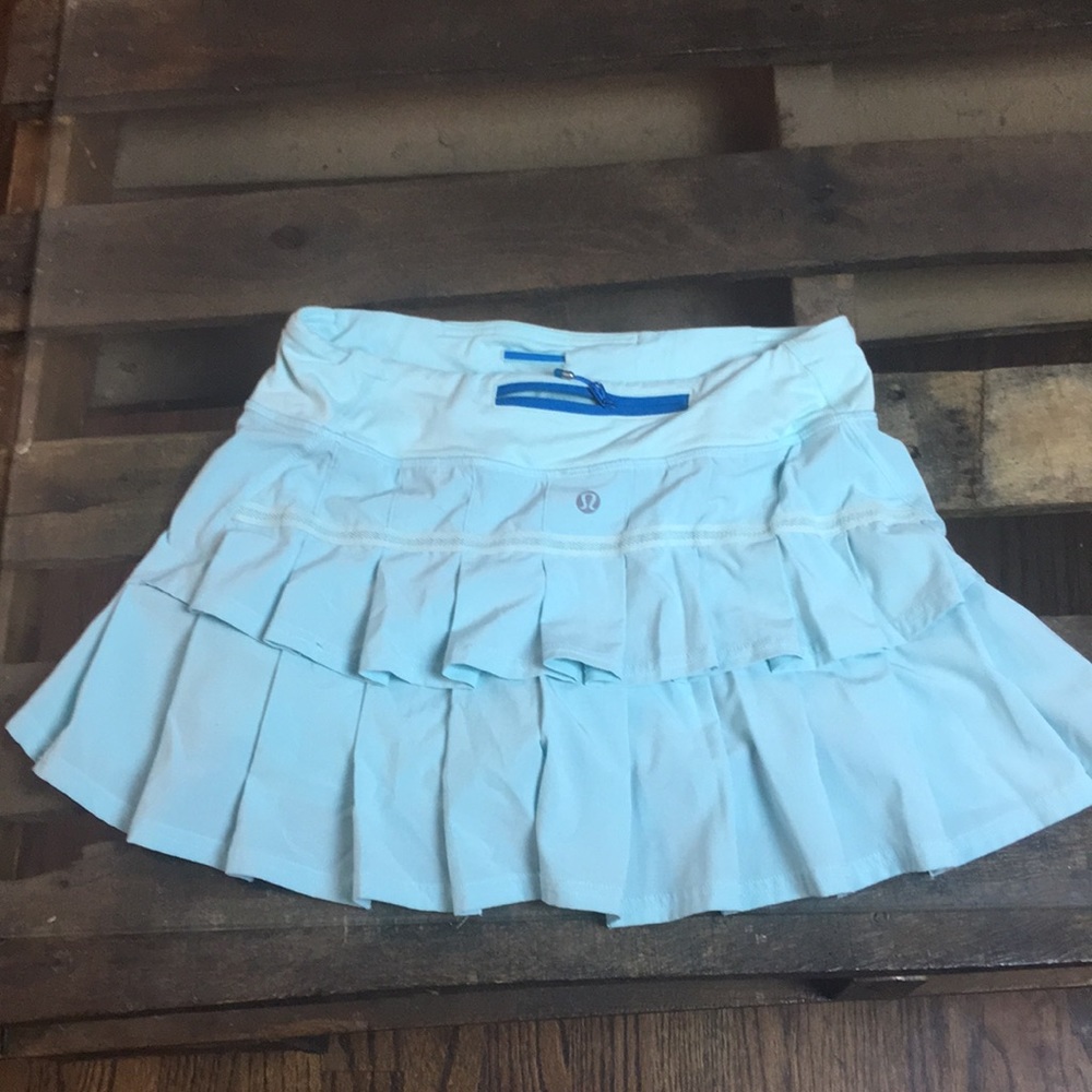Light blue shorts.